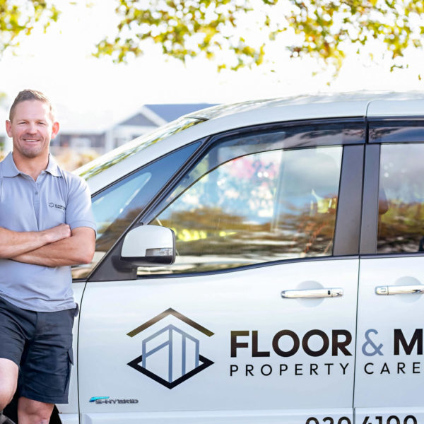 Floor & More - Henk in front of a company branded vehicle